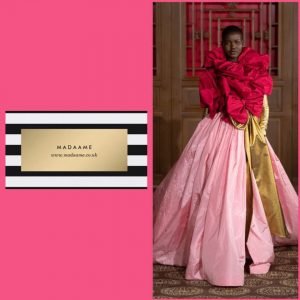 Haute Couture Pink Gown Featuring Red Bows And Golden Sash