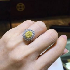White Gold Wedding Ring With Oval Cut Yellow Diamond