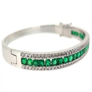 18 carats white gold bangle with Colombian emeralds and channel set diamonds from Madaame
