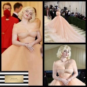 A Barbie doll inspired haute coutre dress in pale orange.